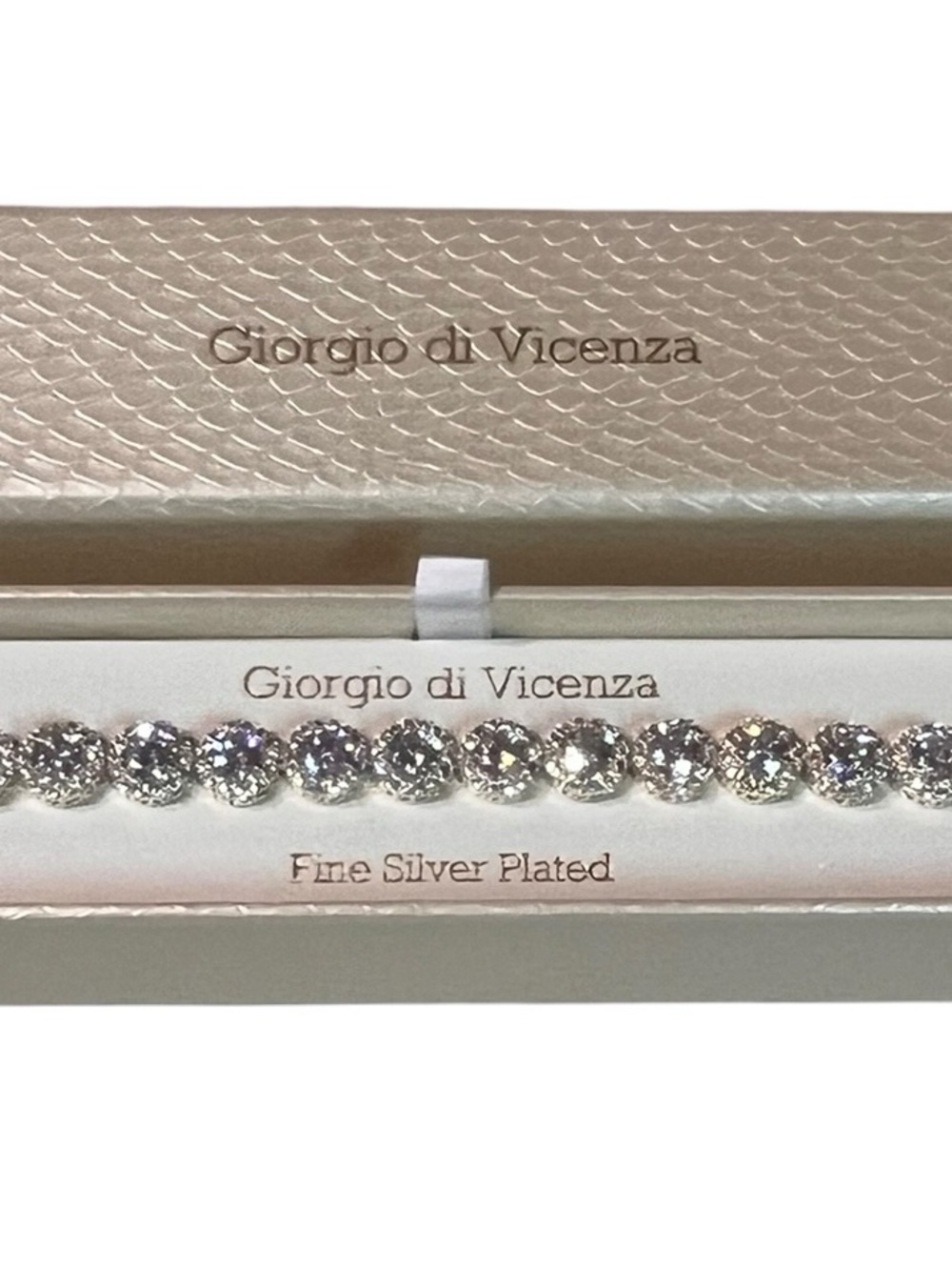 Clear Crystal Tennis Bracelet in Silver
New. Original
Silver Plated
Box
